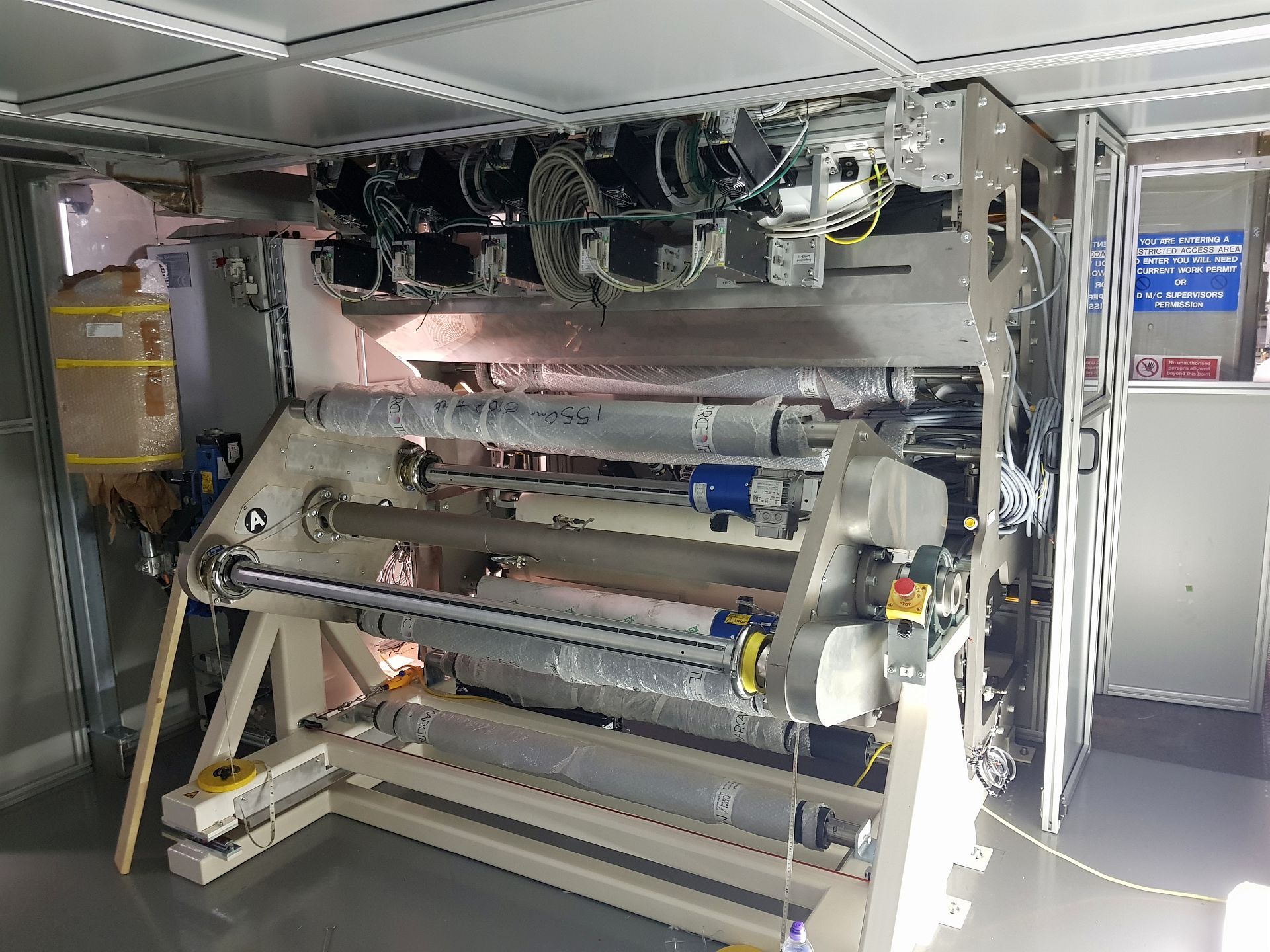 A dual spindle turret unwind system with integrated camera inspection. A dual spindle turret unwind system with integrated camera inspection.